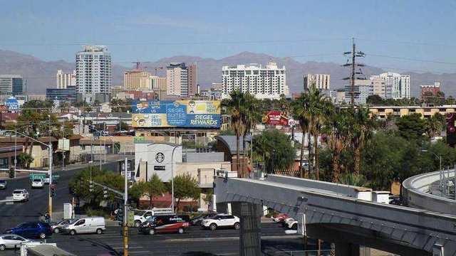Nevada - Las Vegas: Intersection of the Strip and Sahara Avenue - in the background the skyline of downtown La
